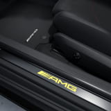 Cover di ricambio AMG per battitacco CLE C236 A236 nero giallo illuminato originale Mercedes-Benz