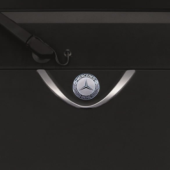 Mercedes-Benz logo framing below windscreen