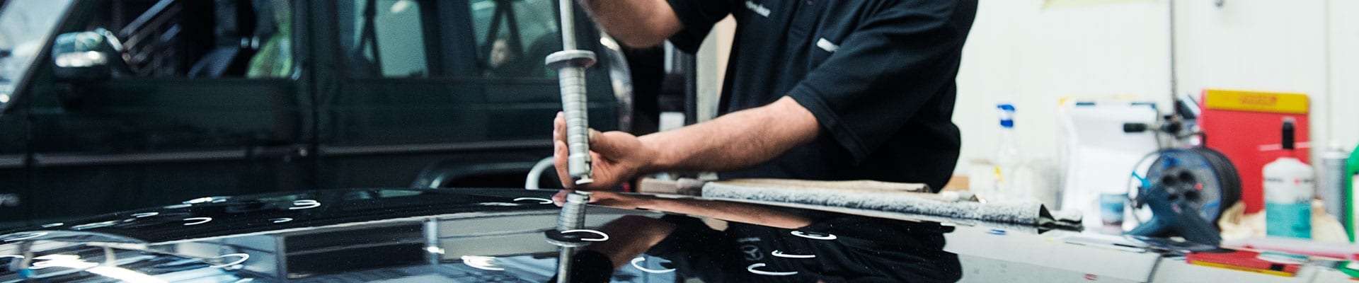 Reparatur von Dellen am Heck 