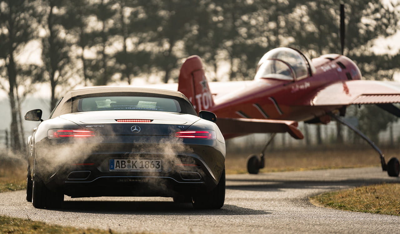 Open Air Mercedes-AMG GT Roadster vs. YAK 55